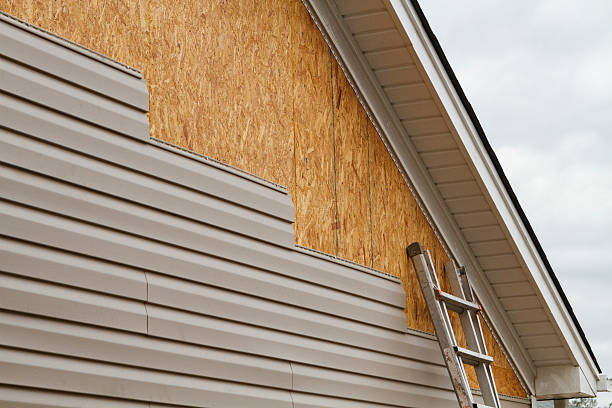 Professional Siding Replacement technician working in Adamsville, OH